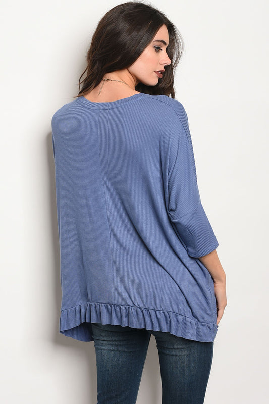 Ladies fashion 3/4 sleeve relaxed fit top with a v neckline