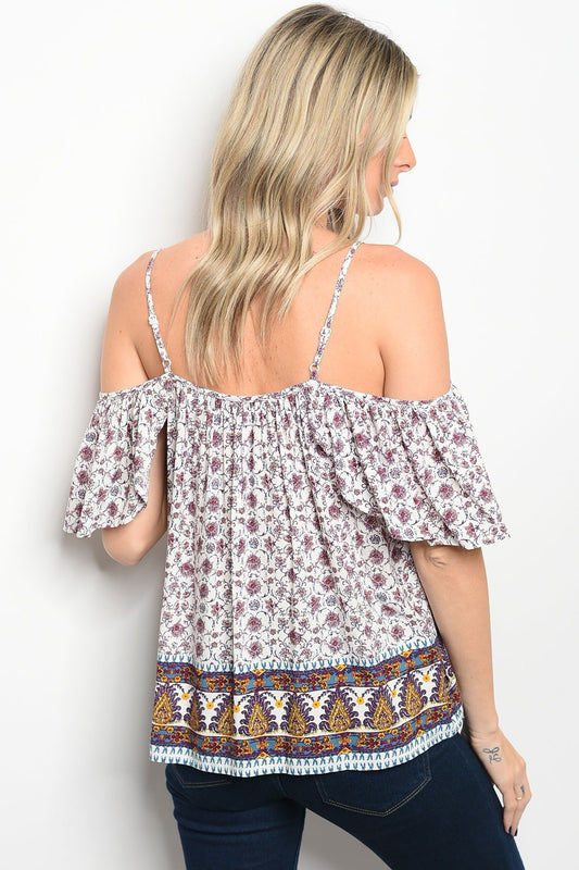 Ladies fashion short sleeve off the shoulder printed top that features a square neckline with a tassel tie