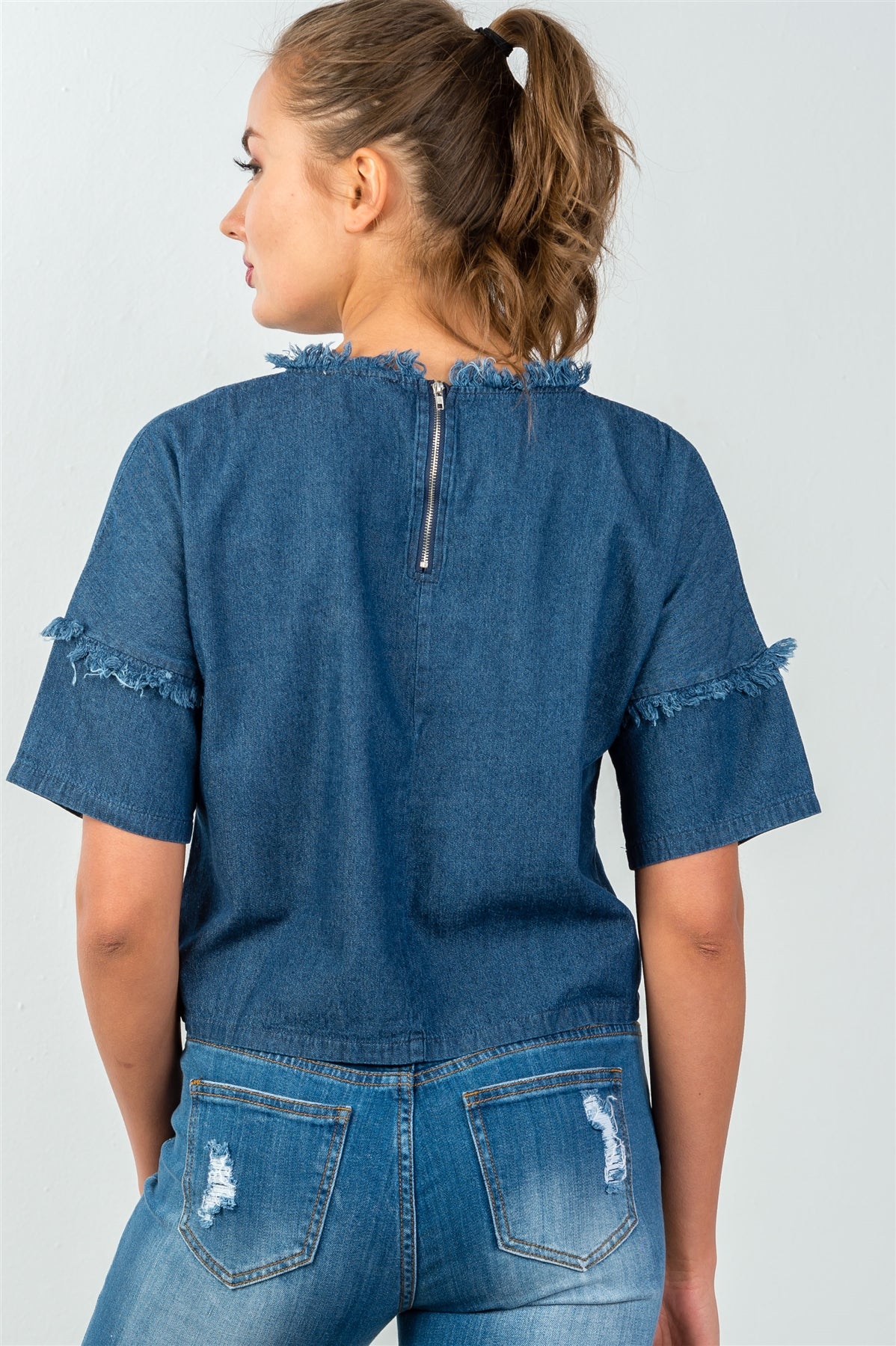Ladies fashion loose fit shredded neckline & sleeves denim top