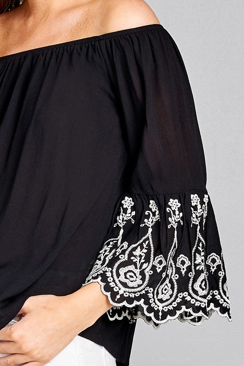 Ladies fashion 3/4 sleeve w/floral embo scallop hem off the shulder woven top