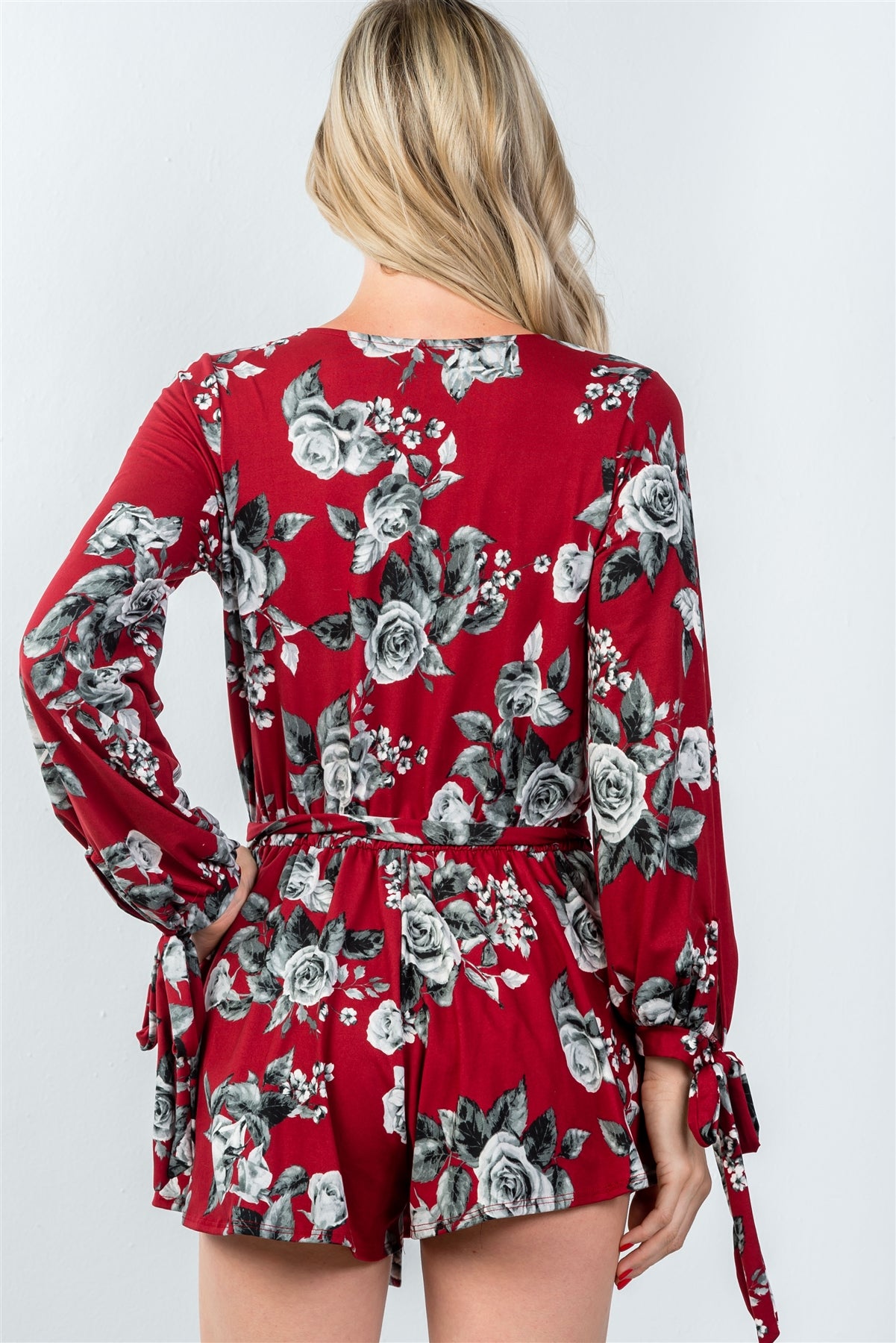 Ladies fashion plunging v-neckline tie long sleeve waist tie floral romper