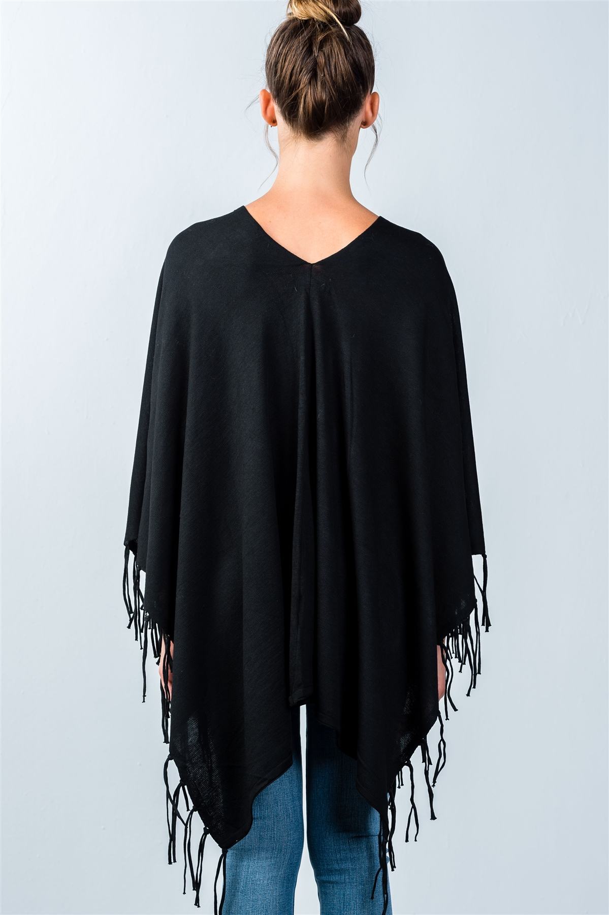 Ladies fashion lace-up front and fringed hem poncho