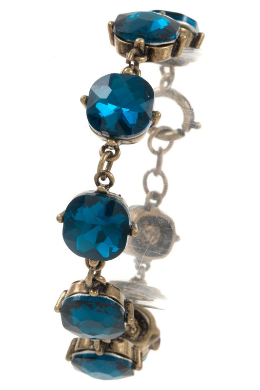 Faceted round framed gem bracelet
