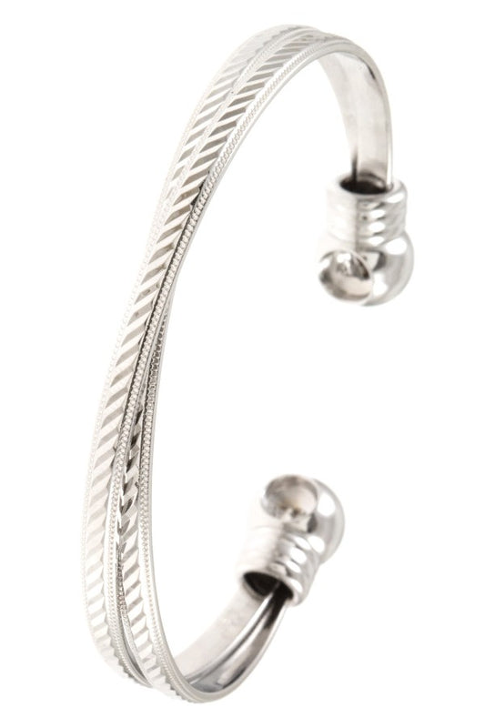 Intertwined etched cuff bracelet