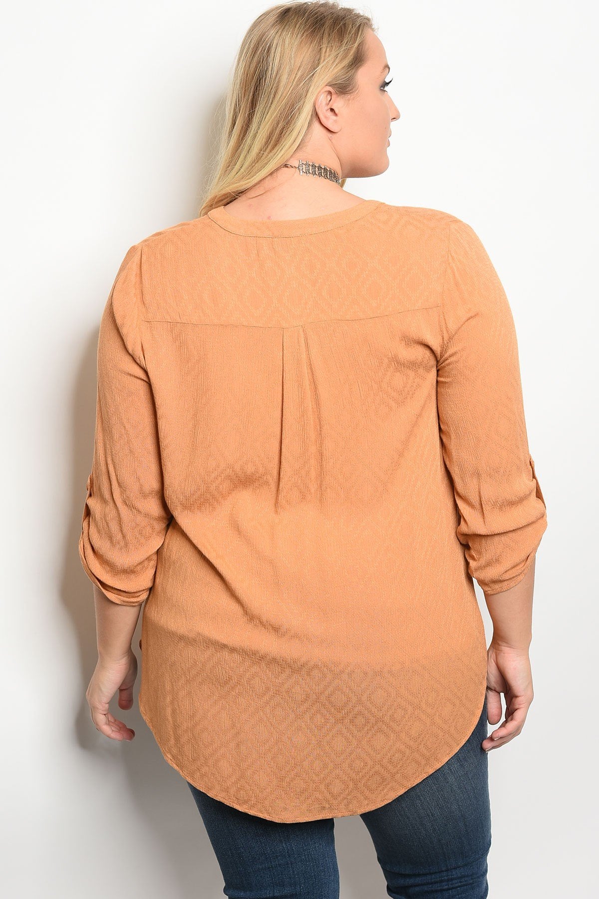 Plus size 3/4 sleeve top with a v neckline