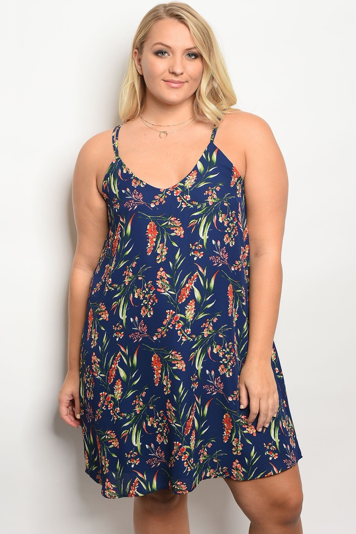 Plus size floral print slip style dress with a v neckline