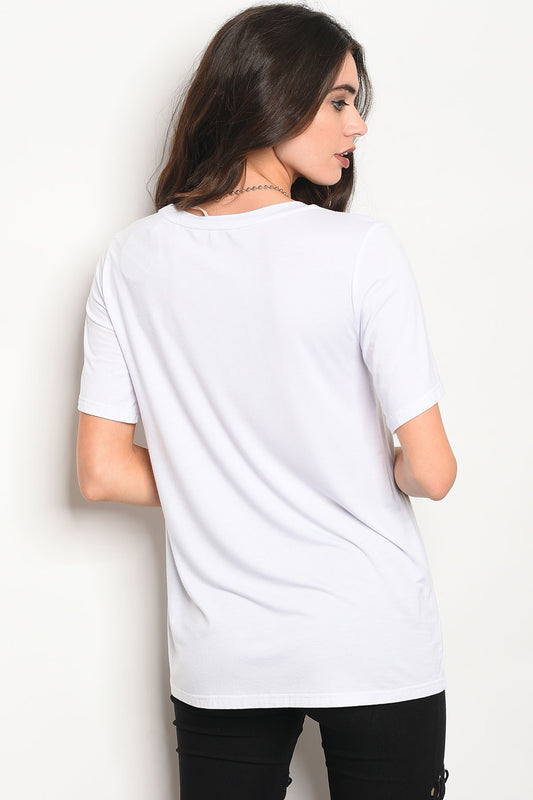 Ladies fashion short sleeve light weight t-shirt with a crew neckline and floral patch details