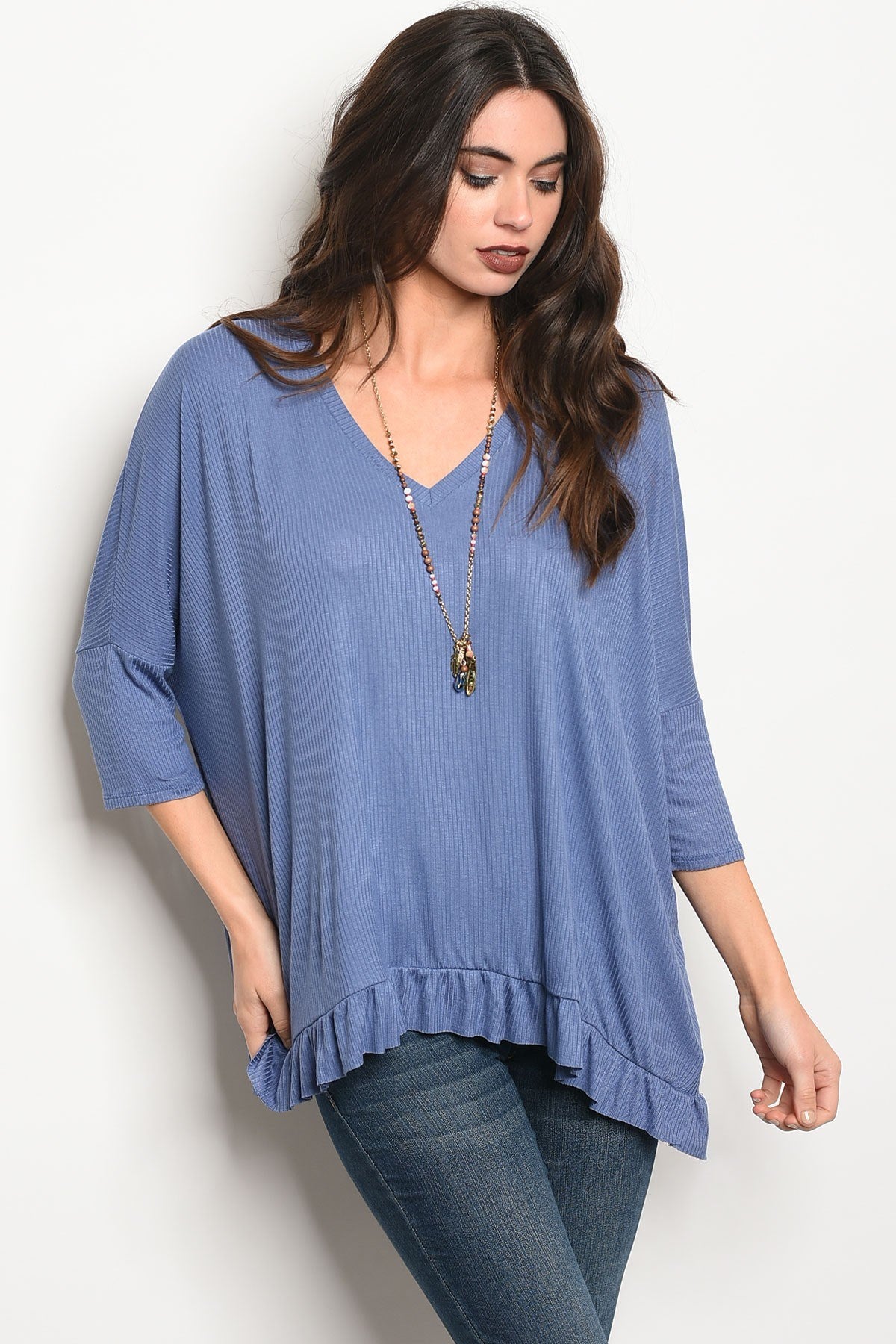 Ladies fashion 3/4 sleeve relaxed fit top with a v neckline