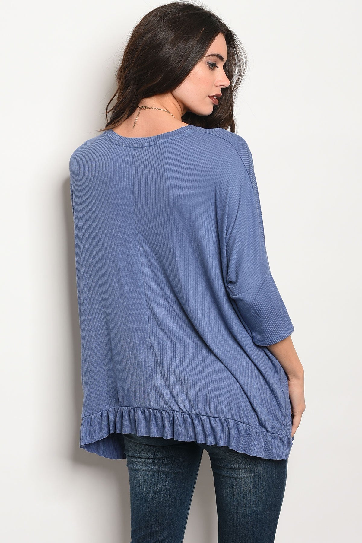Ladies fashion 3/4 sleeve relaxed fit top with a v neckline