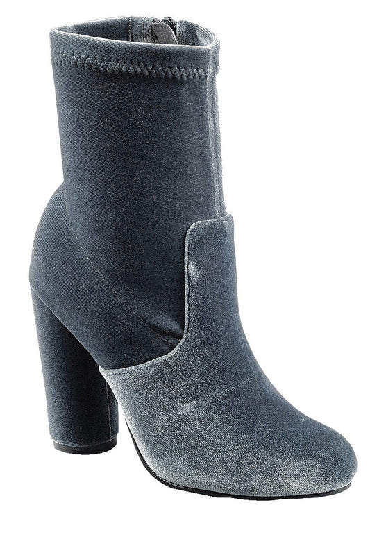Ladies fashion reflections of sock-like ankle boot, closed almond toe, block heel with zipper closure