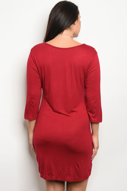Ladies fashion plus size relaxed fit jersey knee length dress that features a v neckline