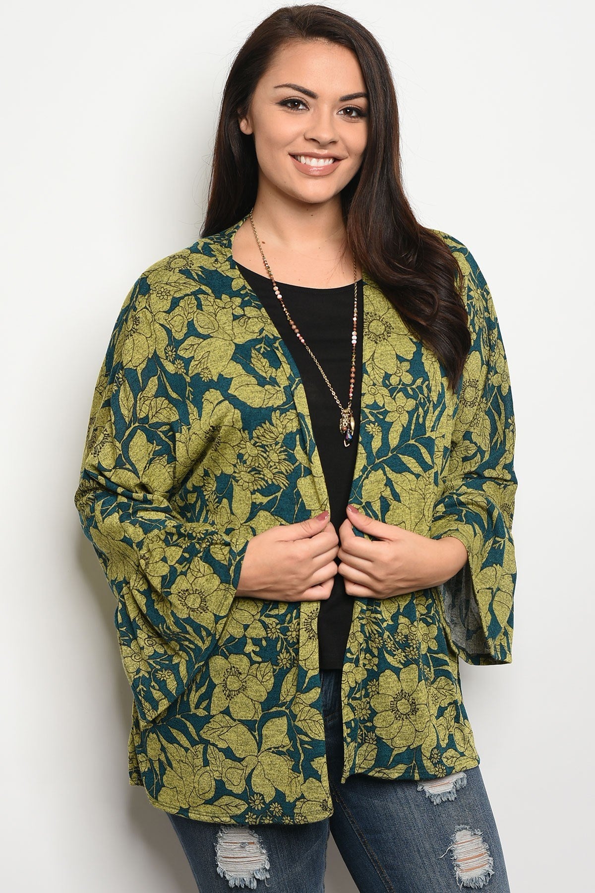 Ladies fashion plus size light weight floral print cardigan that features long sleeves