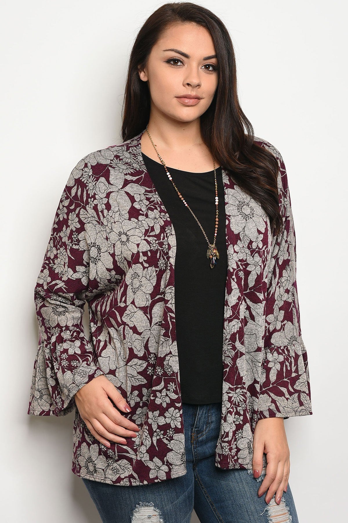 Ladies fashion plus size light weight floral print cardigan that features long sleeves