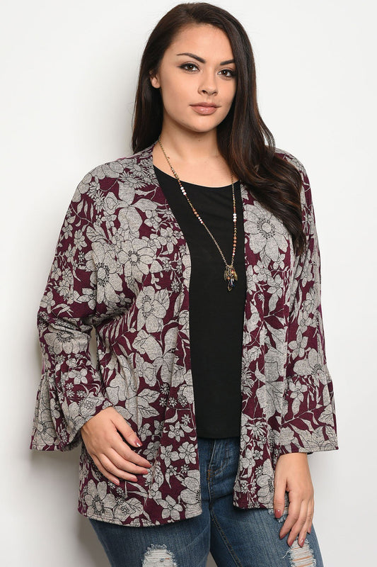Ladies fashion plus size light weight floral print cardigan that features long sleeves