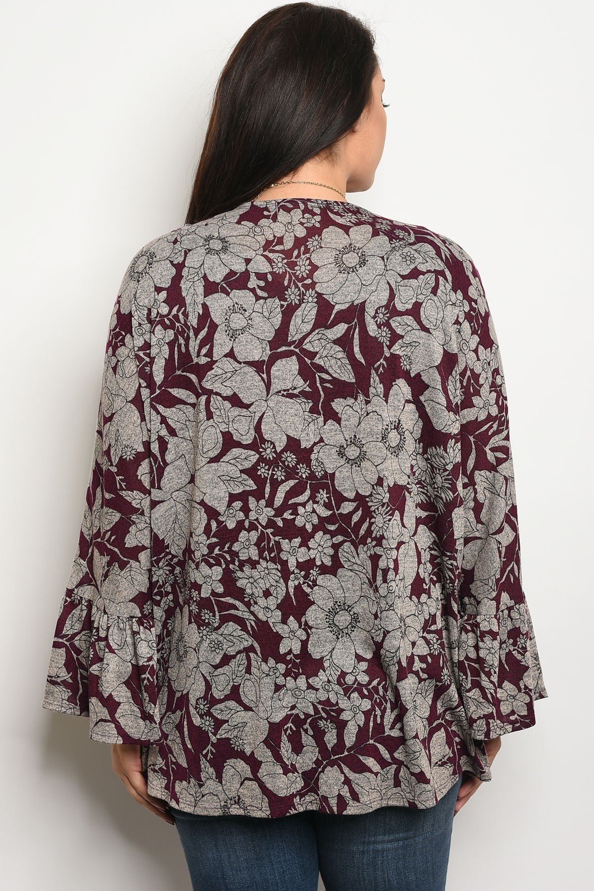 Ladies fashion plus size light weight floral print cardigan that features long sleeves