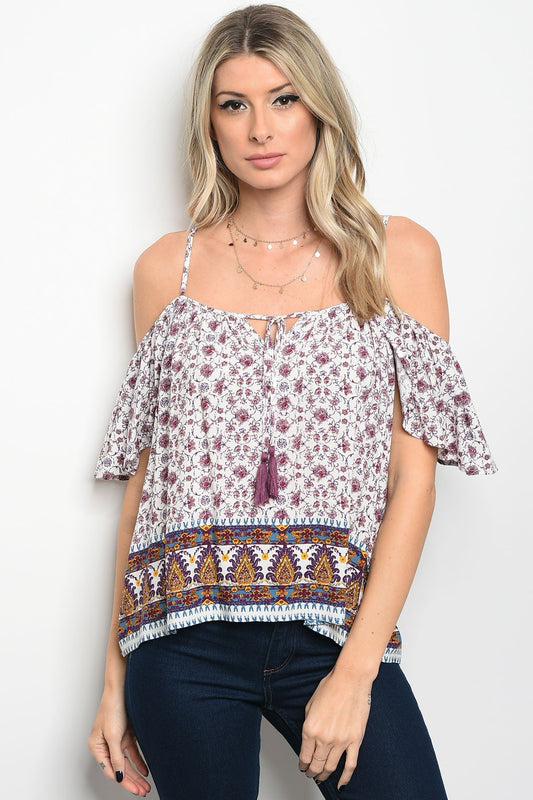 Ladies fashion short sleeve off the shoulder printed top that features a square neckline with a tassel tie