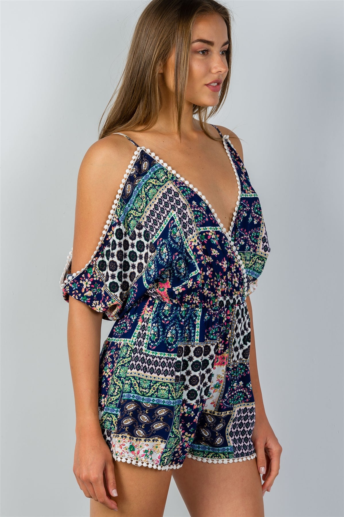 Ladies fashion floral cold shoulder pompom detail romper