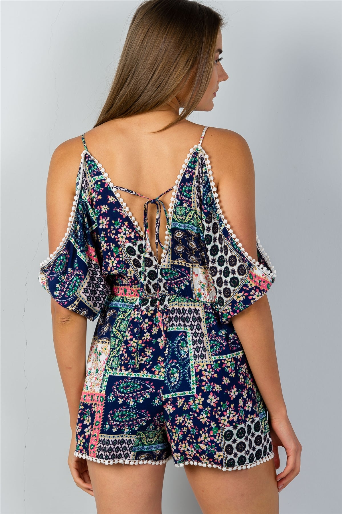 Ladies fashion floral cold shoulder pompom detail romper