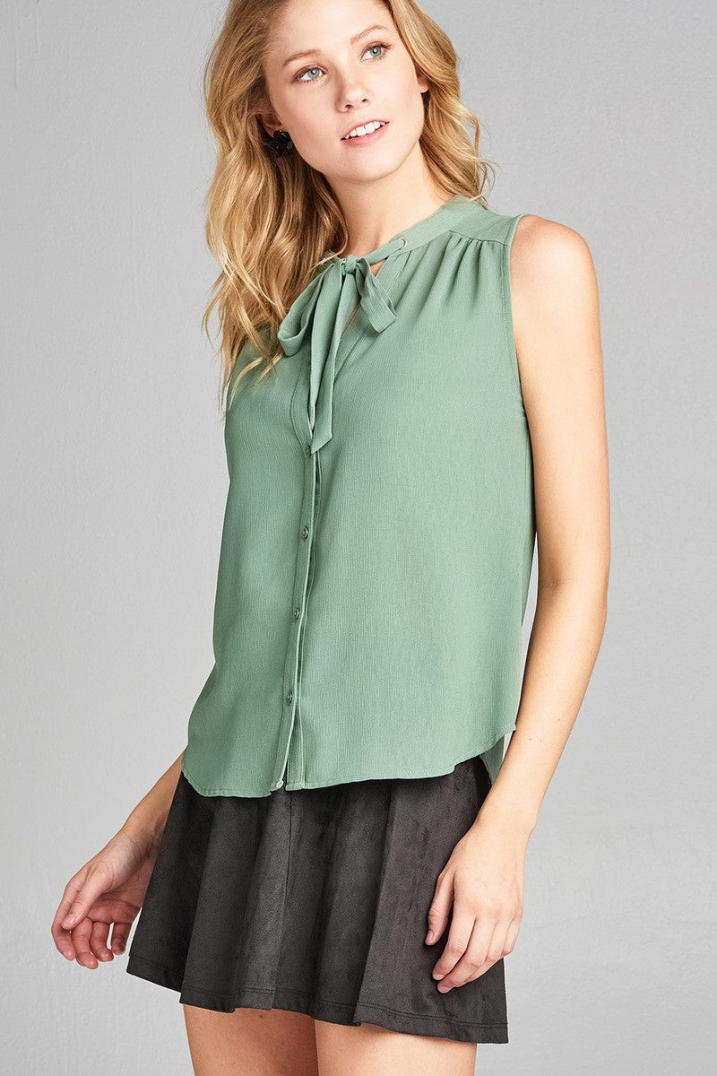Ladies fashion sleeveless v-neck self tie w/eyelet detail front button woven top