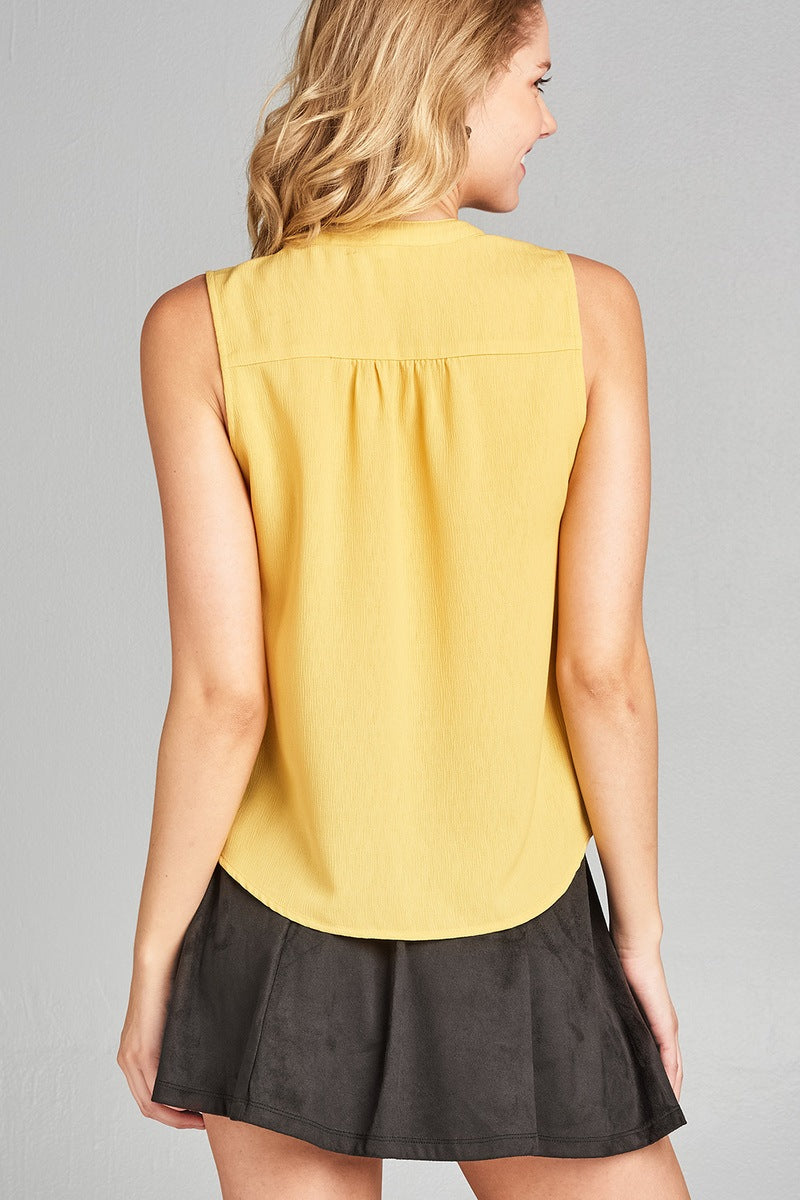 Ladies fashion sleeveless v-neck self tie w/eyelet detail front button woven top