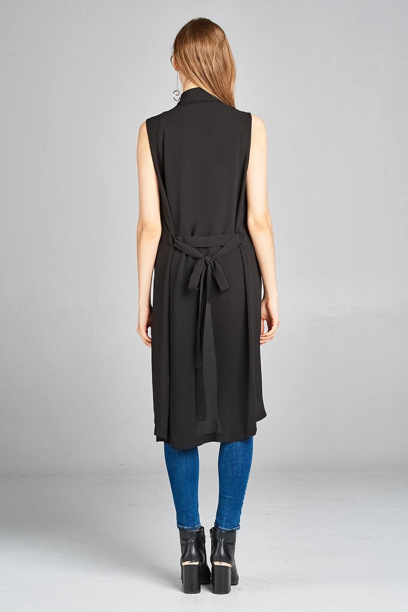 Ladies fashion sleeveless shawl lapel handkerchief hem waist belt knee length woven jacket