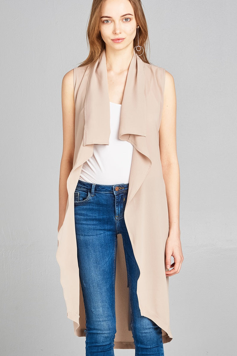 Ladies fashion sleeveless shawl lapel handkerchief hem waist belt knee length woven jacket