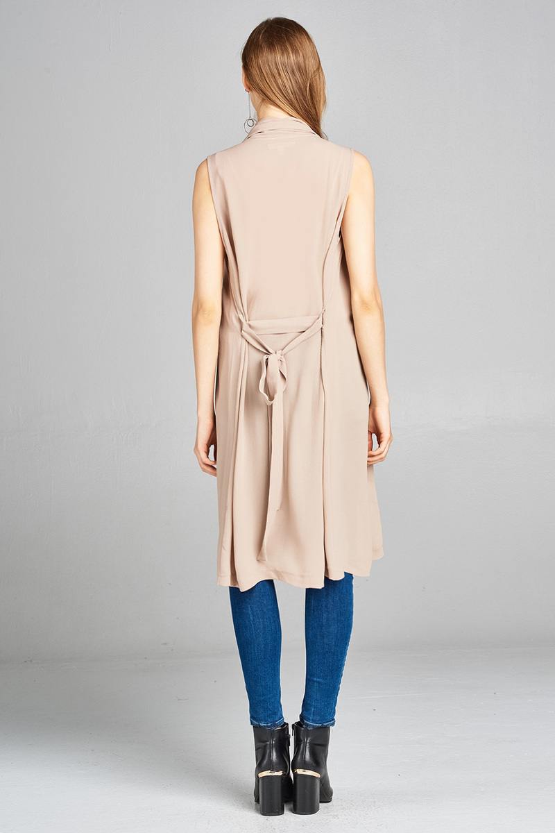 Ladies fashion sleeveless shawl lapel handkerchief hem waist belt knee length woven jacket