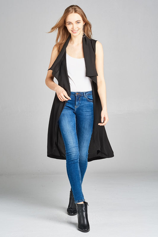 Ladies fashion sleeveless shawl lapel handkerchief hem waist belt knee length woven jacket