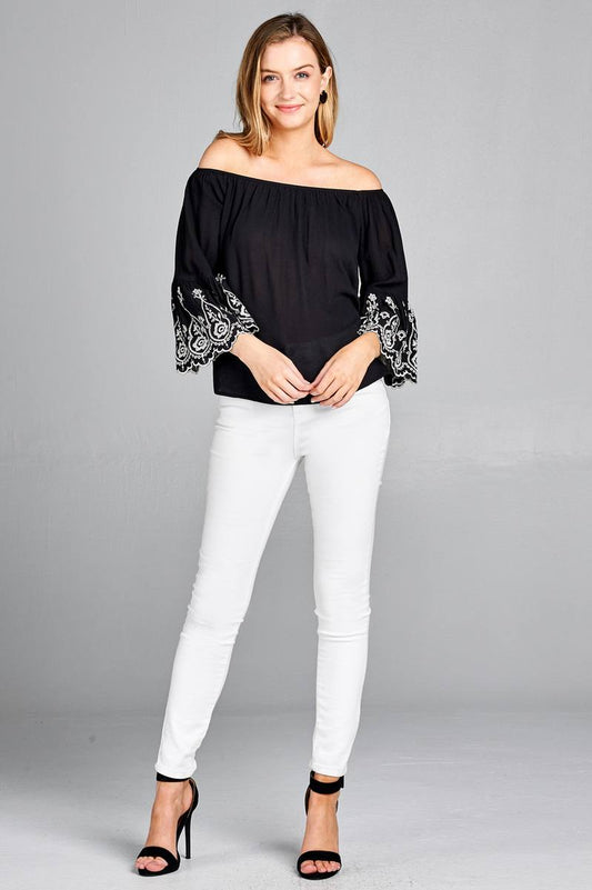 Ladies fashion 3/4 sleeve w/floral embo scallop hem off the shulder woven top
