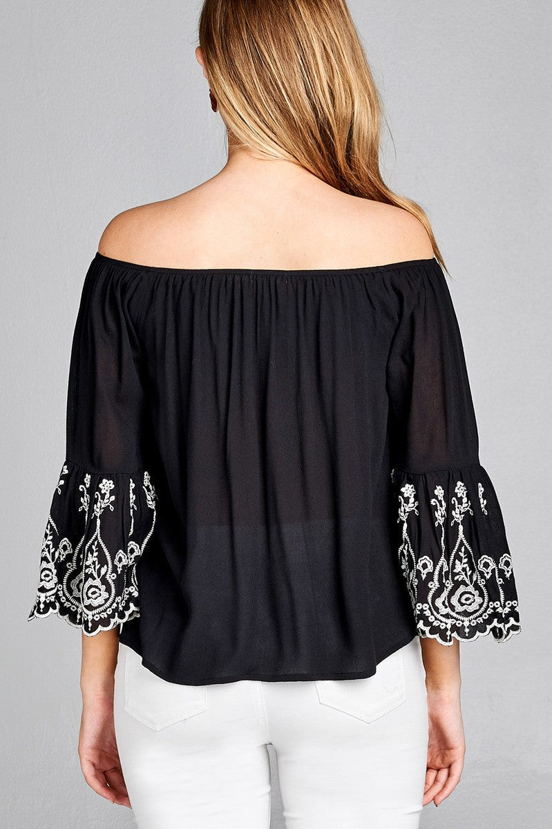 Ladies fashion 3/4 sleeve w/floral embo scallop hem off the shulder woven top