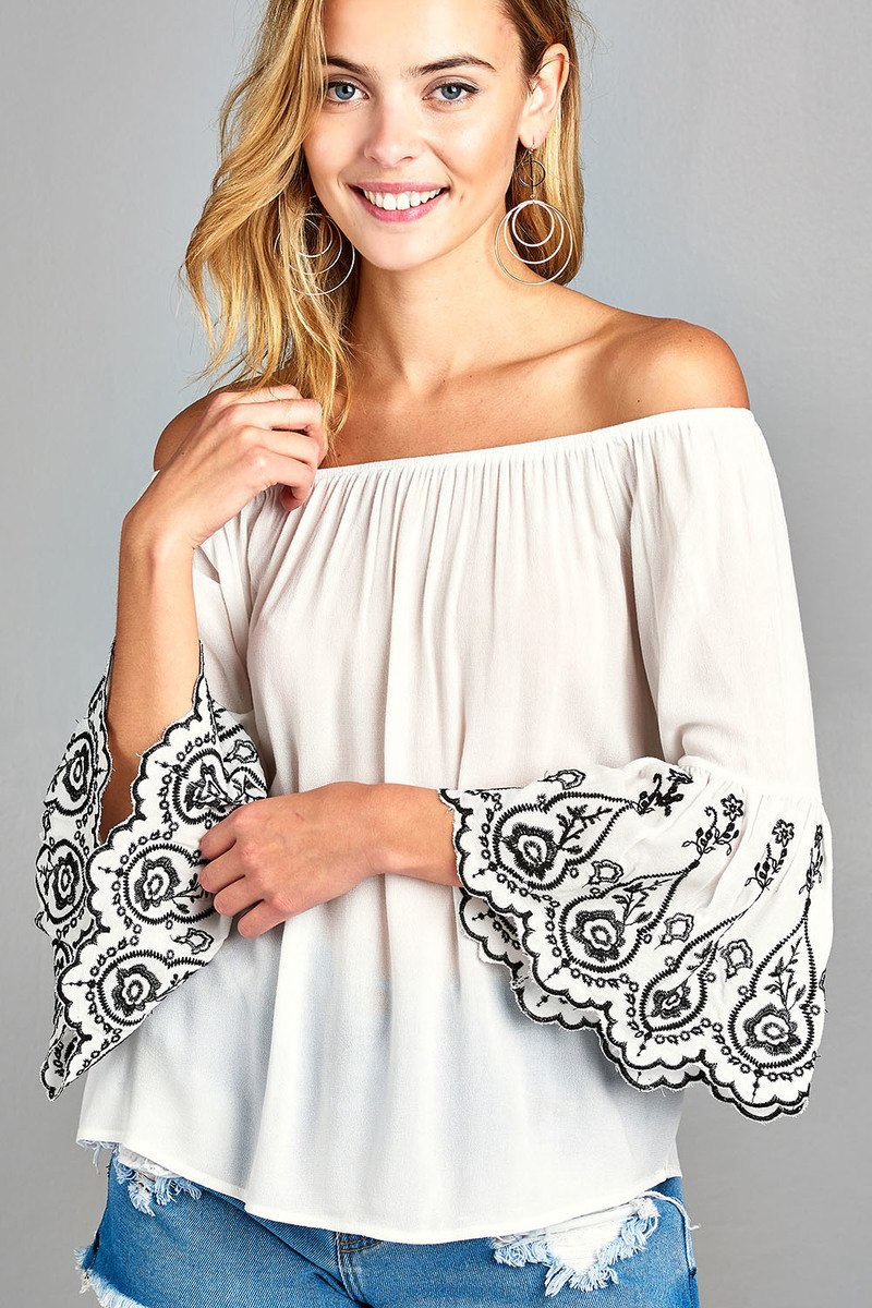Ladies fashion 3/4 sleeve w/floral embo scallop hem off the shulder woven top