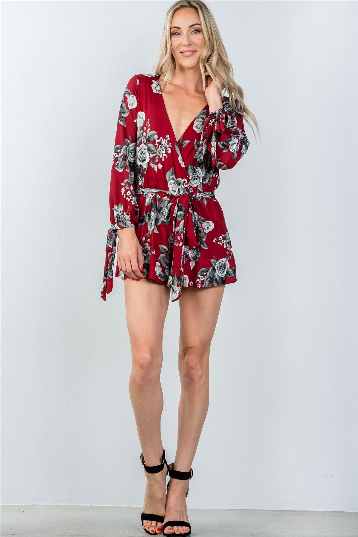 Ladies fashion plunging v-neckline tie long sleeve waist tie floral romper