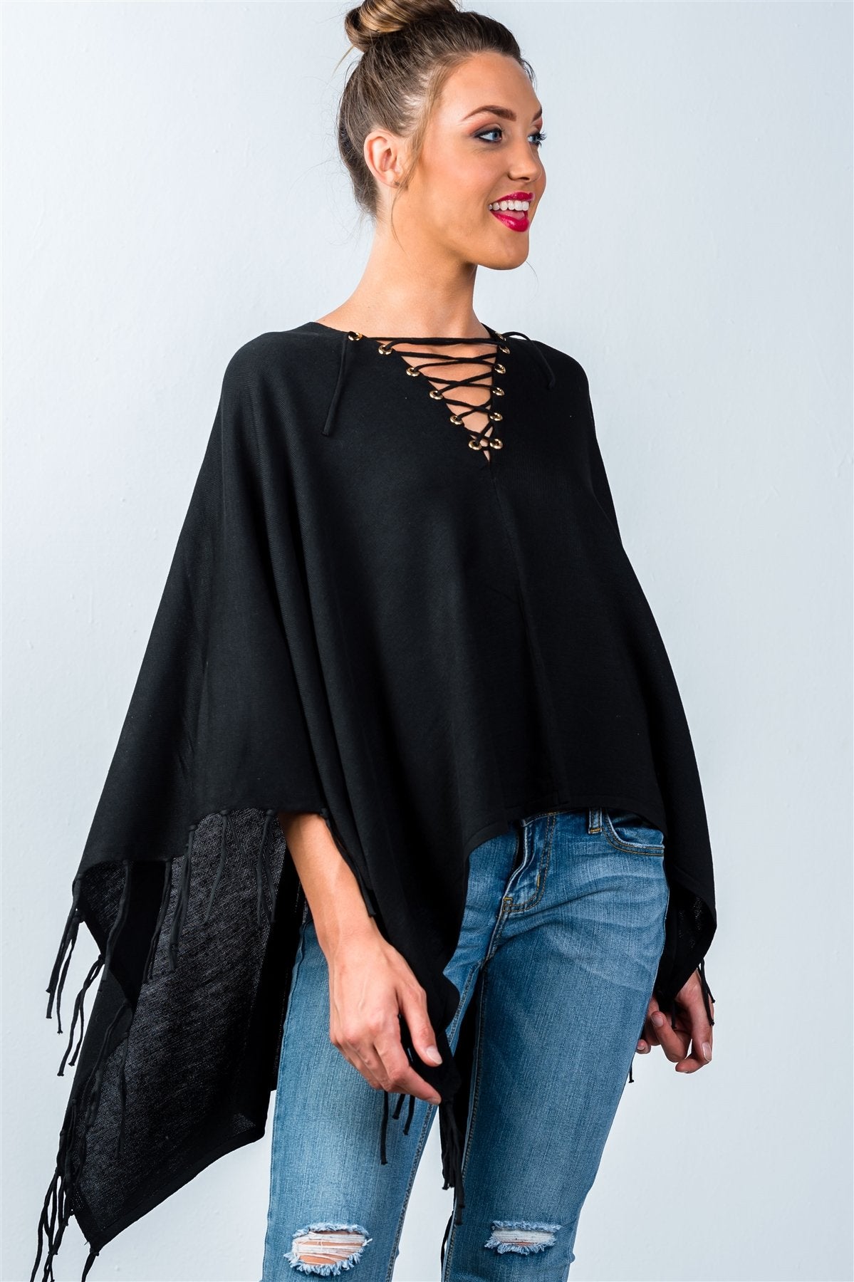 Ladies fashion lace-up front and fringed hem poncho