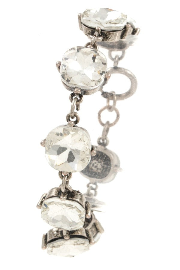 Faceted round framed gem bracelet