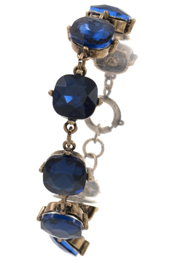 Faceted round framed gem bracelet