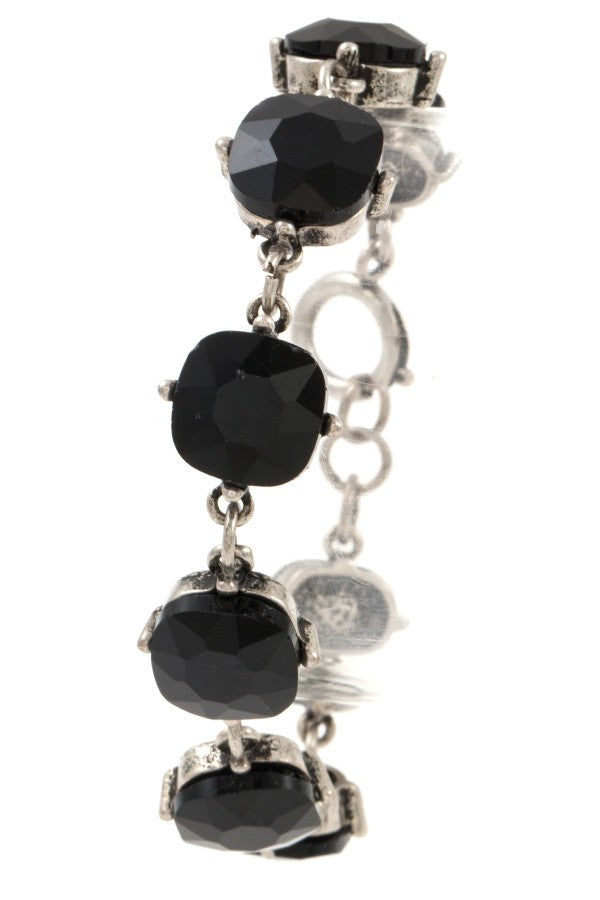 Faceted round framed gem bracelet