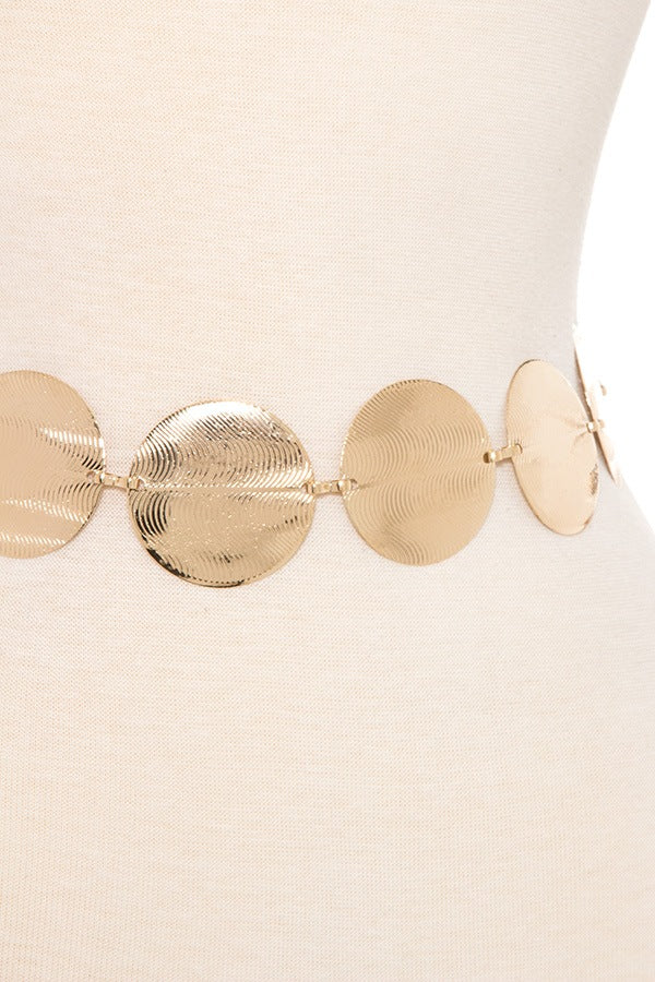 Waved etched disk metal link belt