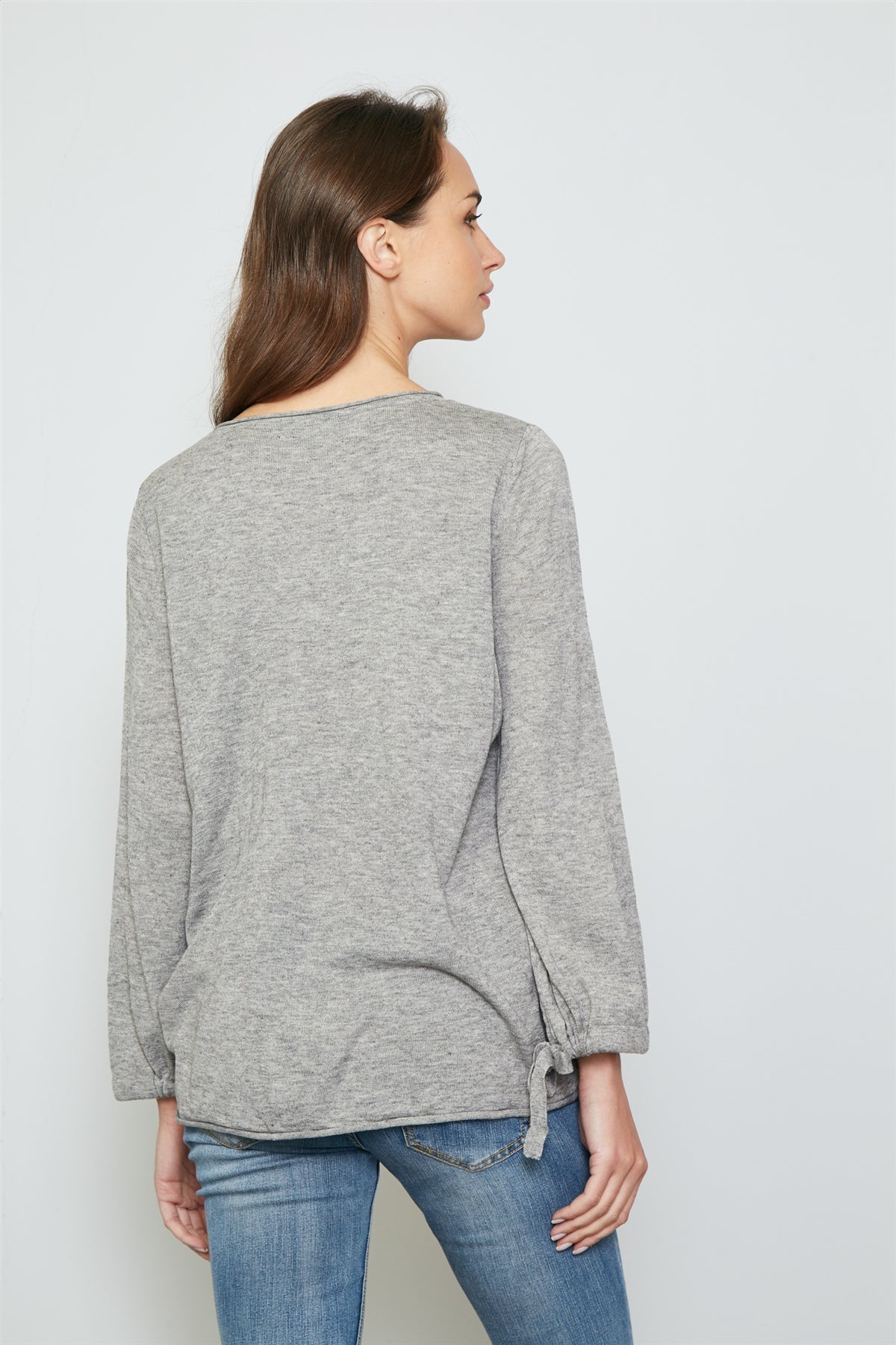 Ladies fashion tie cuff rolled hem sweatshirt
