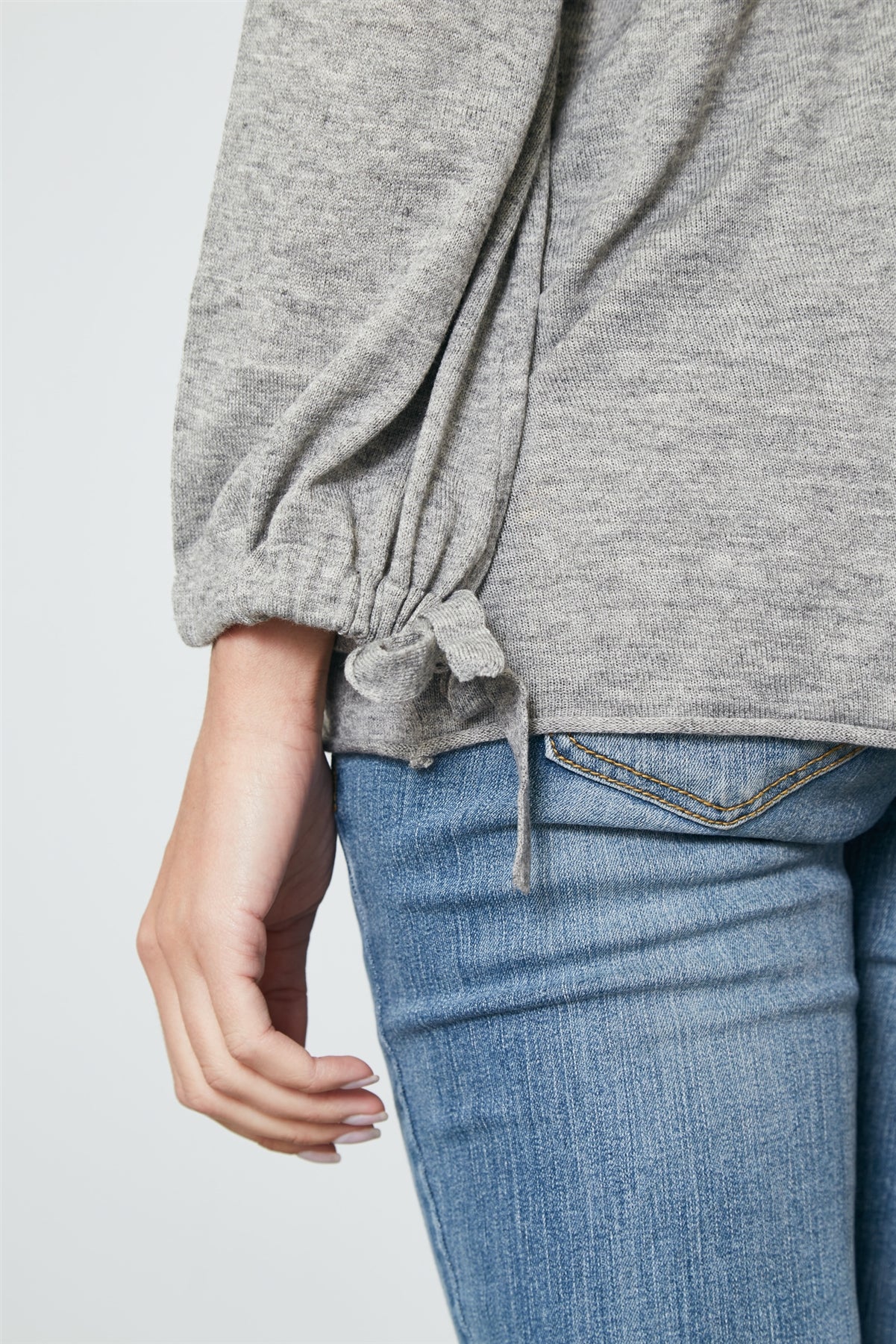 Ladies fashion tie cuff rolled hem sweatshirt