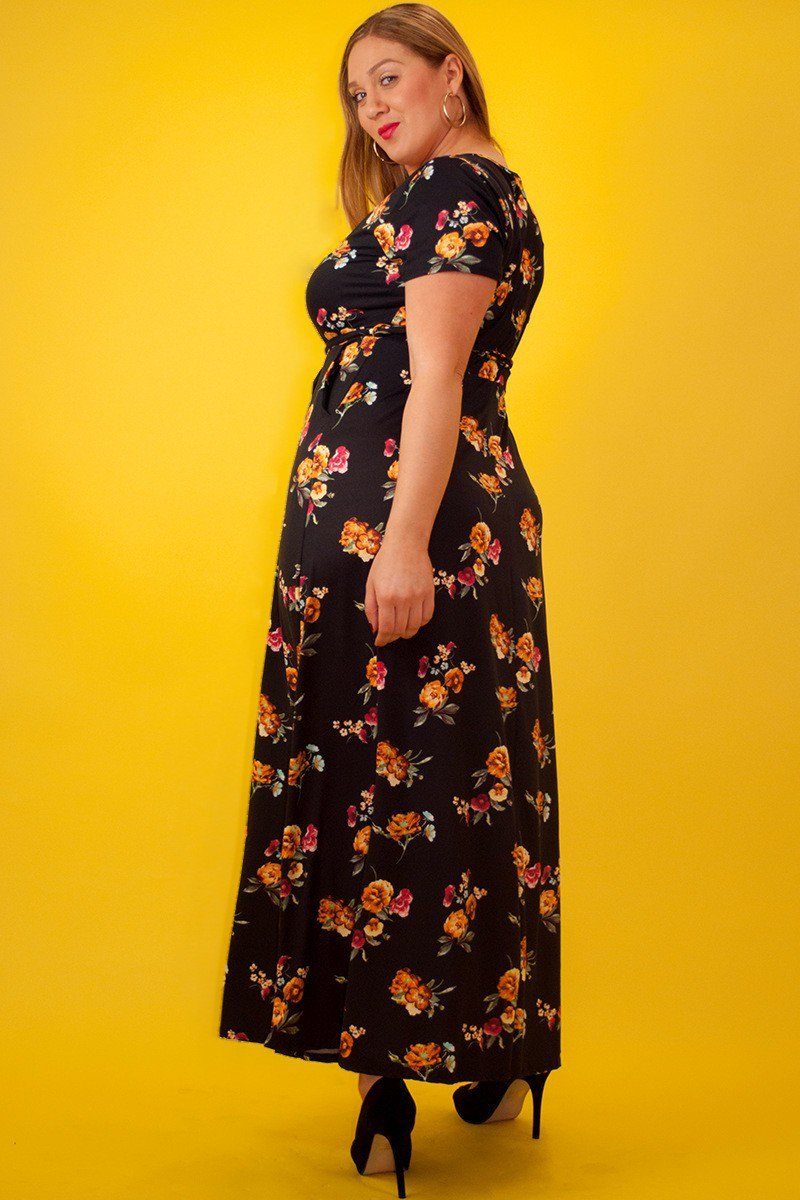 Rose Print Maxi Dress In A Relaxed Fit And Flare Style With A Wrapped V-neck, Short Sleeves, Side Pockets And Waist Tie Belt