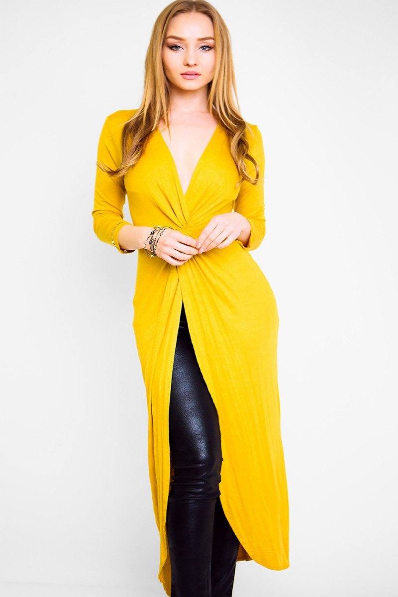 Solid, Think Knit, Button Down Cardigan With Long Sleeves And Front Pockets In A Oversize Loose Fit