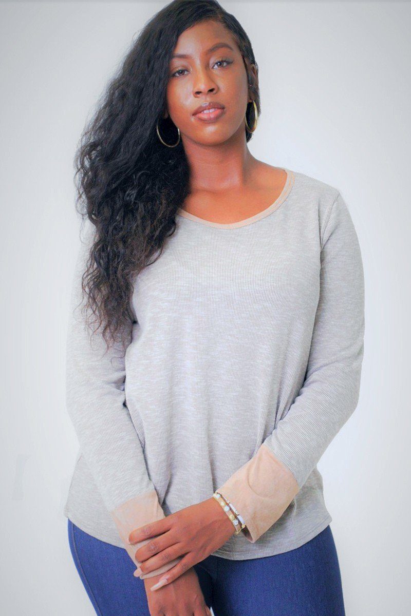 Solid, Waist Length Long Sleeve Top In A Relaxed Style With A Round Neck And Faux Suede Contrast Wrist Cuff.