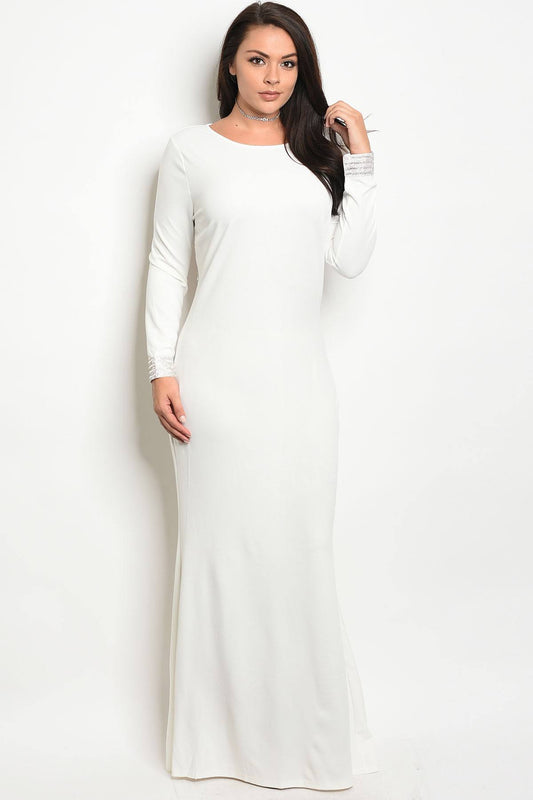 Ladies fashion long sleeve fitted plus size gown with a rounded neckline and open back with jeweled accents